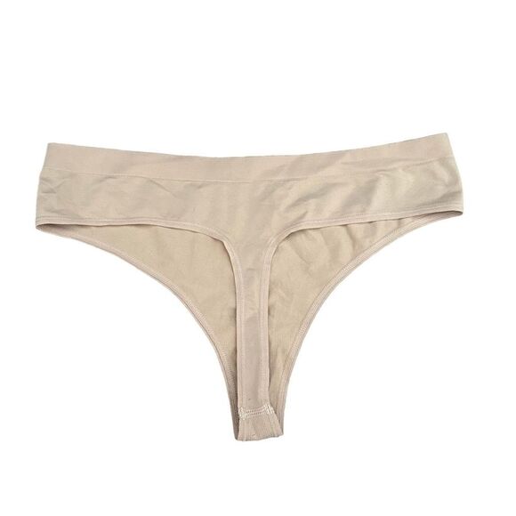 SKIMS Fits Everybody Soft Smoothing Seamless Thong In Ochre Nude - Picture 5 of 6